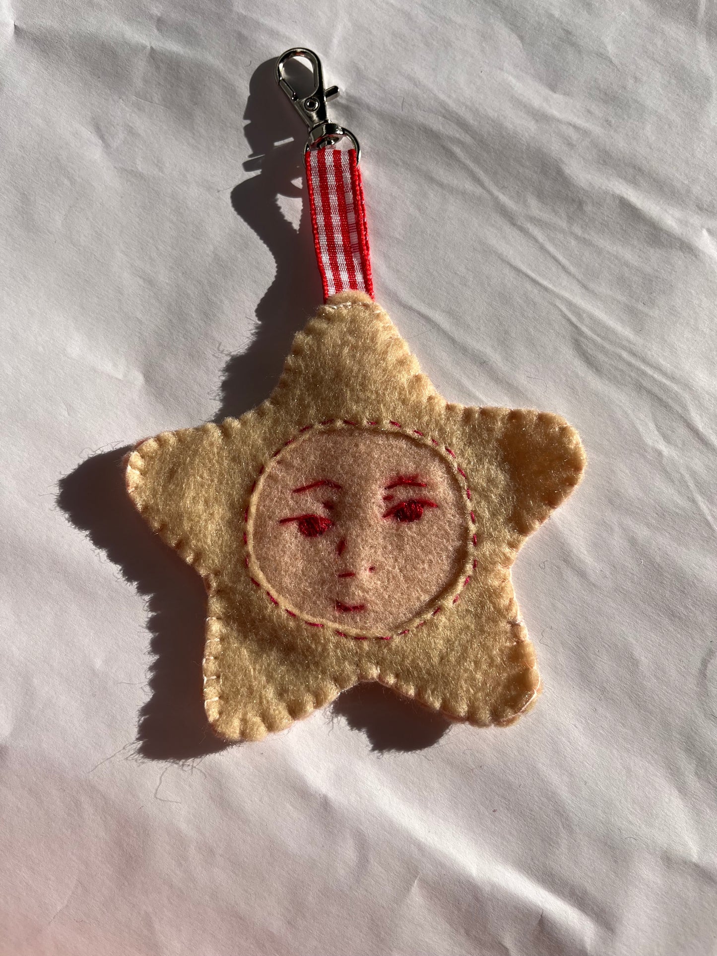 Creme star keychain