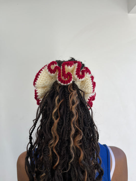Medium creme and deep red coloured scrunchie