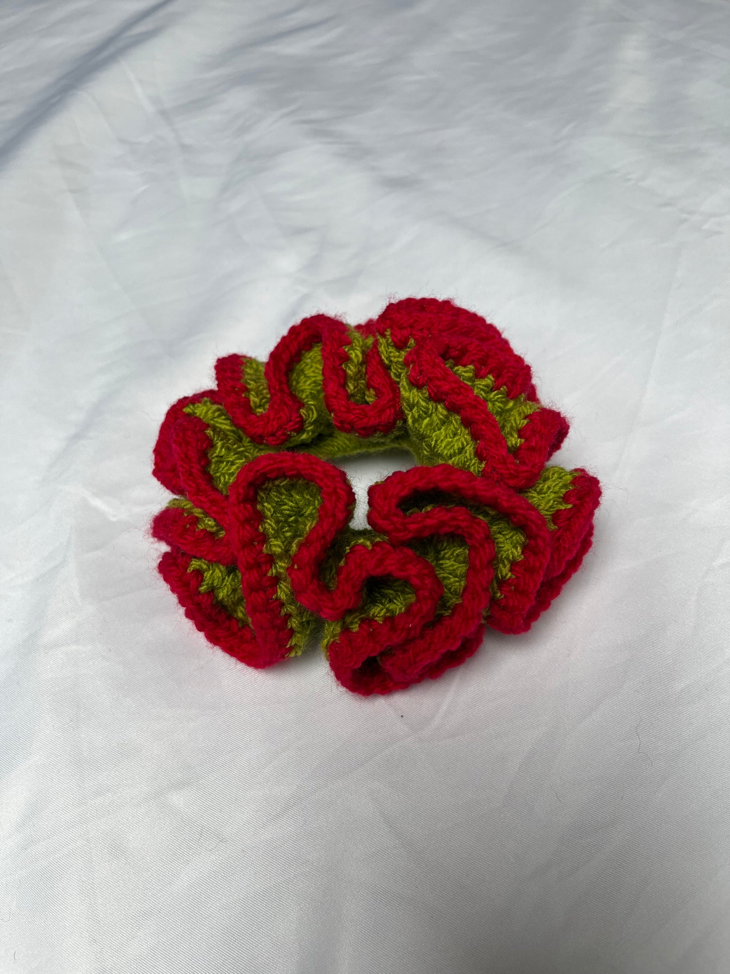 Medium vibrant red and green coloured scrunchie