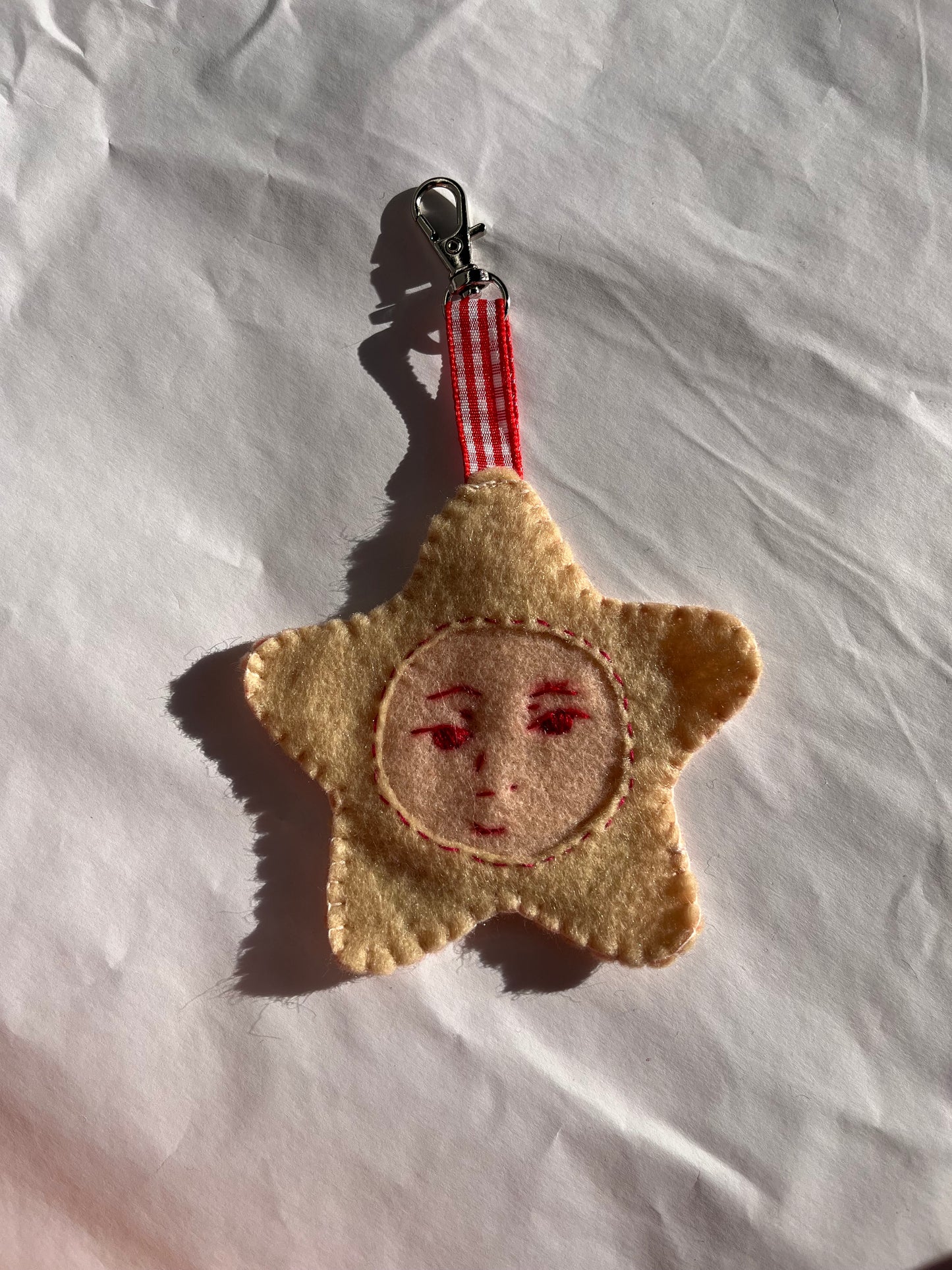 Creme star keychain